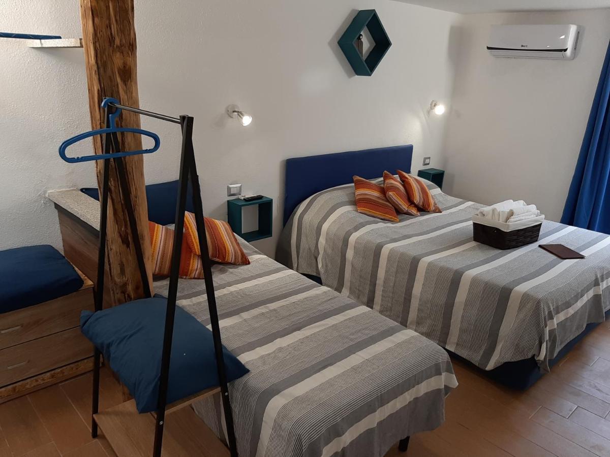 Portopollo Surfhouse Barrabisa Екстер'єр фото