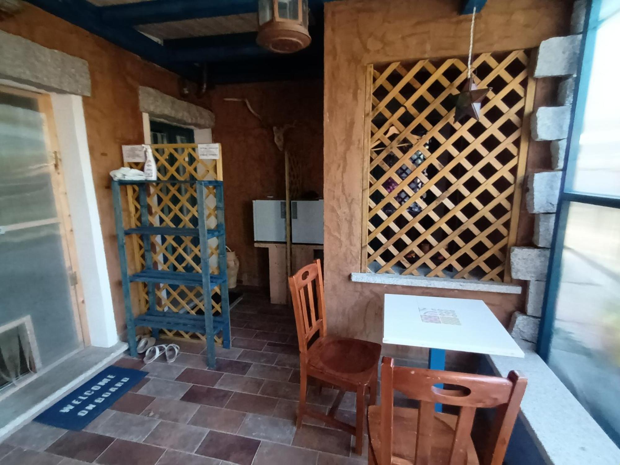 Portopollo Surfhouse Barrabisa Екстер'єр фото