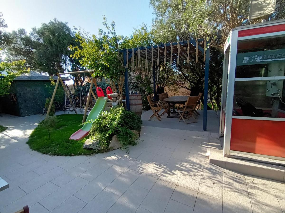 Portopollo Surfhouse Barrabisa Екстер'єр фото