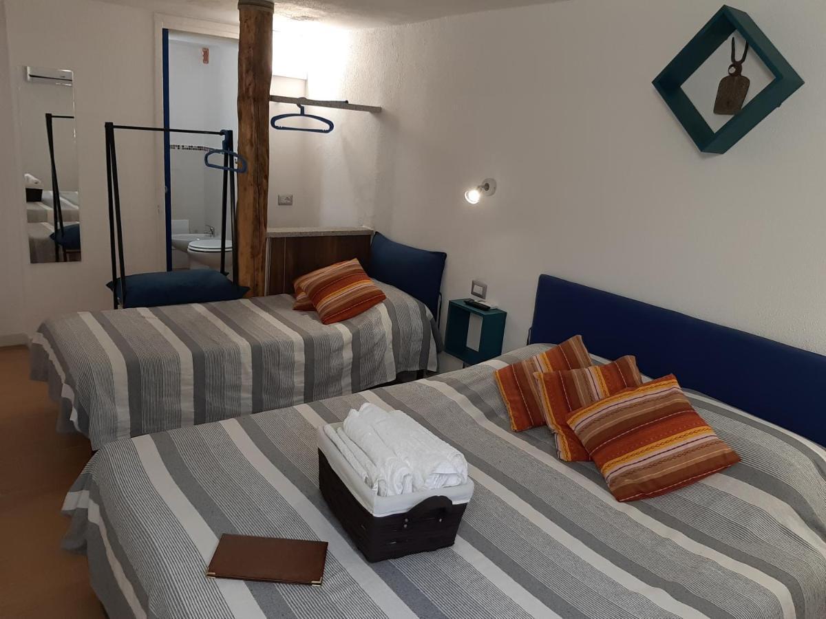 Portopollo Surfhouse Barrabisa Екстер'єр фото