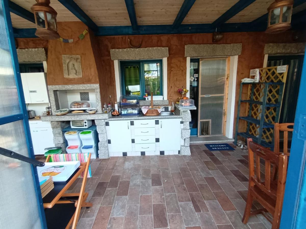 Portopollo Surfhouse Barrabisa Екстер'єр фото