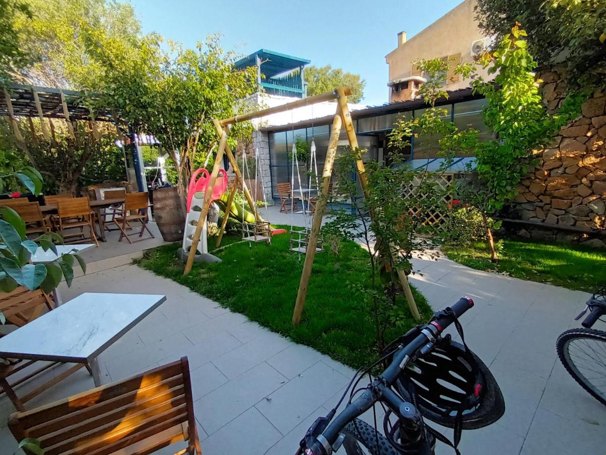 Portopollo Surfhouse Barrabisa Екстер'єр фото