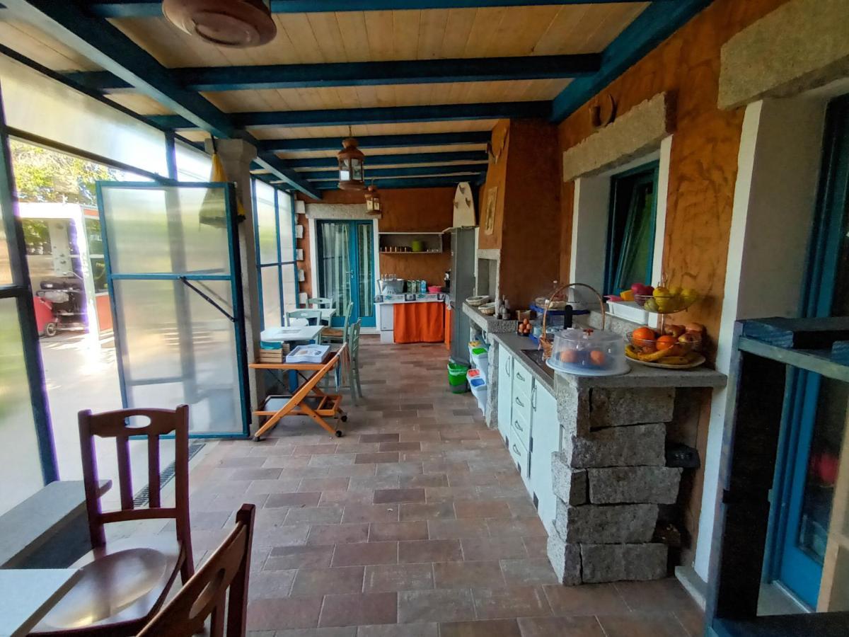 Portopollo Surfhouse Barrabisa Екстер'єр фото